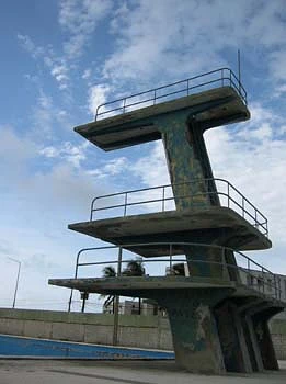 Diving tower behind a clear sky.